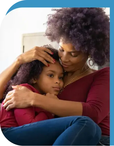 a mother comforting her child