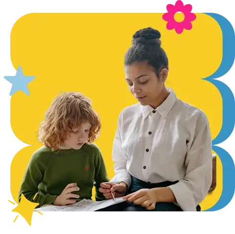 woman teaching a young boy to read