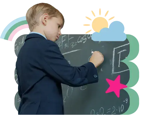a boy in suit writing in a chalkboard