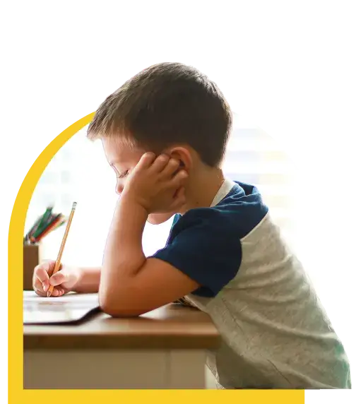 boy sitting and writing