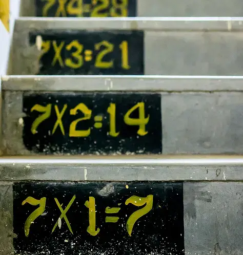 math problems written at a stairs