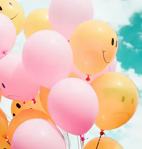 balloons with emoji faces