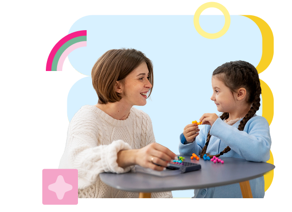 a woman playing puzzle toys to a young girl