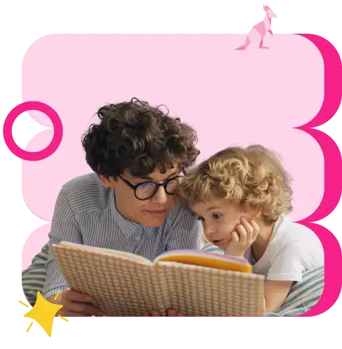 two boys reading a book