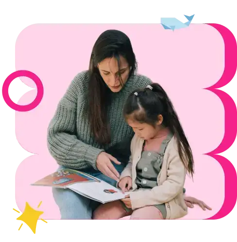a woman teaching a girl to read