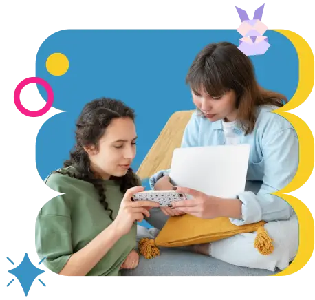two woman looking at a smartphone